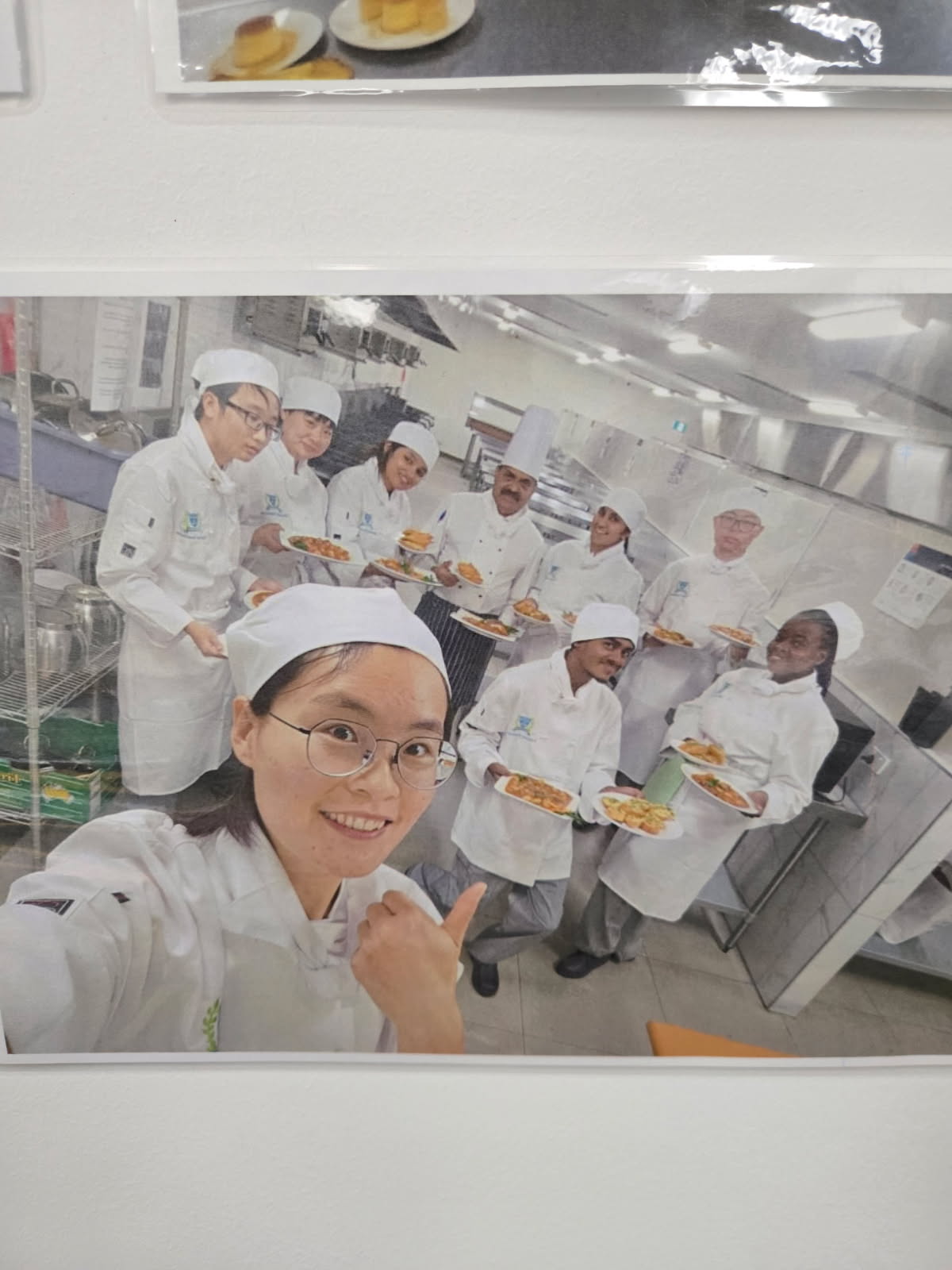 Jinyan Chen and classmates with Chef Mano at Clinton Institute training kitchen